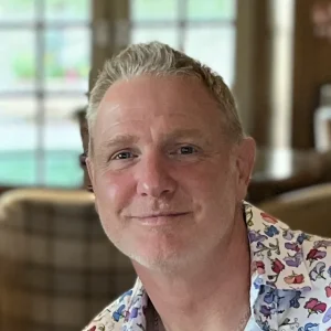 Aaron Coward, founder of Creative Mushroom, smiling